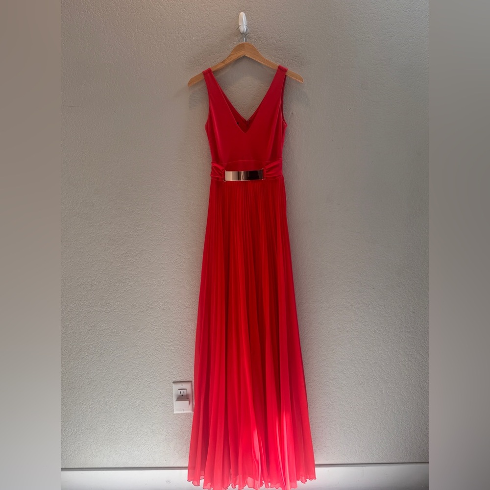 Red Pleated V-Neck Maxi Dress Sleeveless with a gold belt
